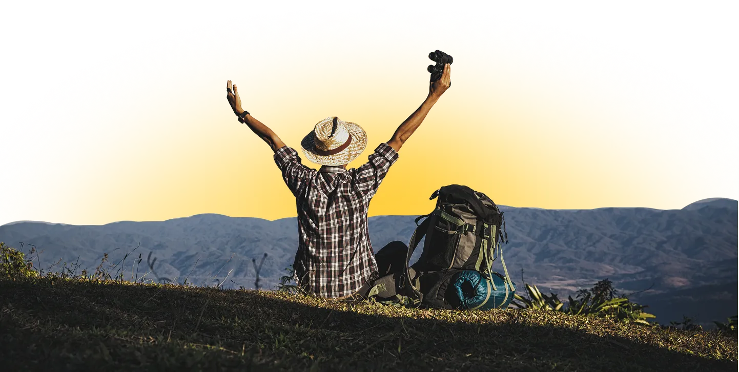 Traveler with backpack enjoying mountain view